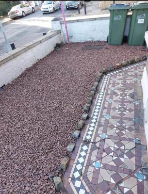 Overgrown front garden cleared and levelled in Rochester