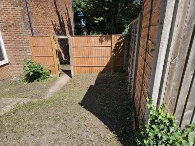 Rear garden cleared of waste and overgrowth in Rochester