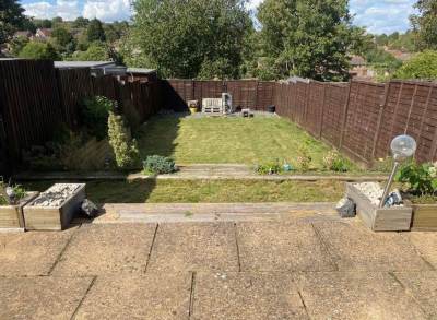 New patio area finished with clean edging in a Kent garden
