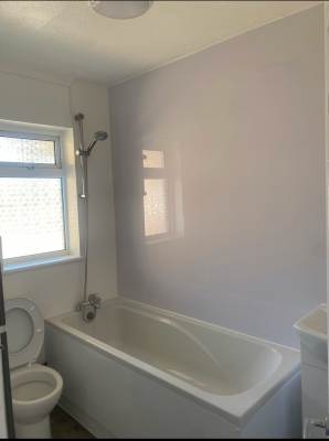 Basin, pedestal and taps fitted in a newly refurbished bathroom