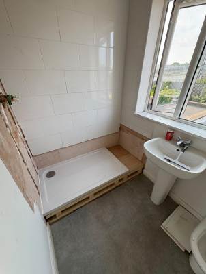 Shower tray installed on a new timber base in a Kent bathroom