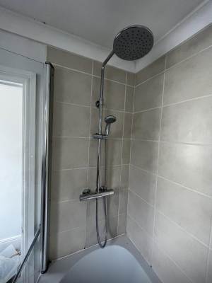 Shower valve and pipework installed in a Rochester property