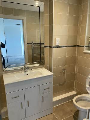 Completed plumbing work in a refurbished Kent bathroom